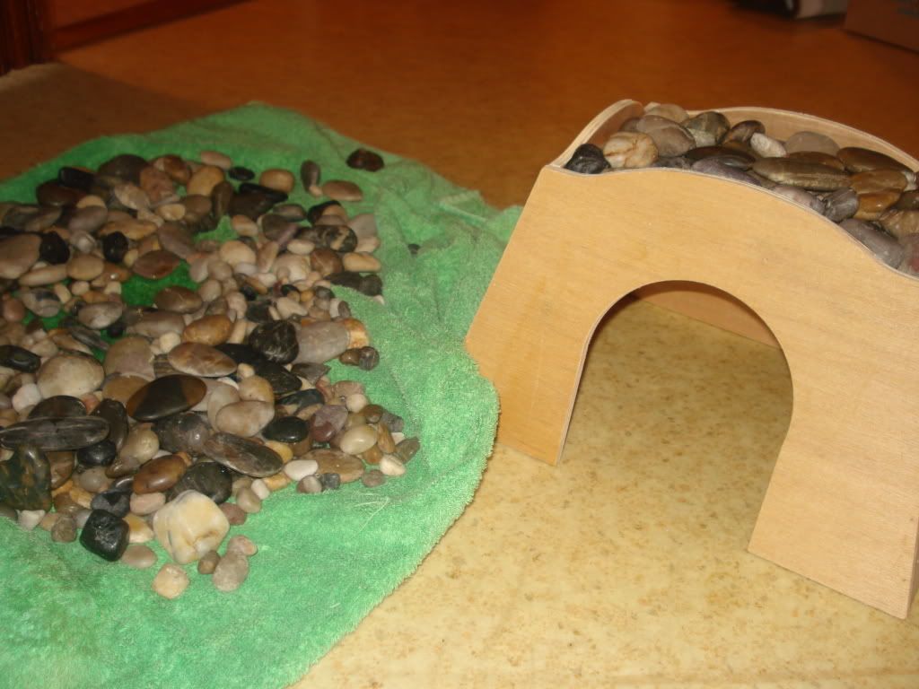 Need ideas how to stick rocks to a wooden hideout DIY