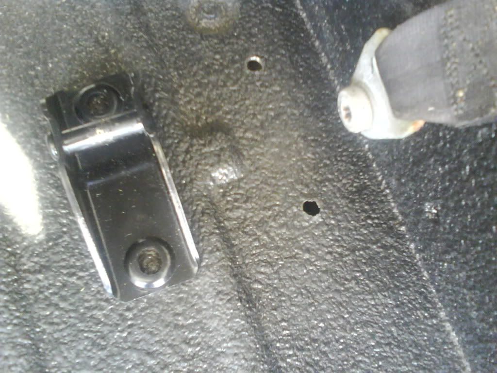Installing 2004 back seat in a 1998 TJ. Rear brackets, how do you attach/bolt them?